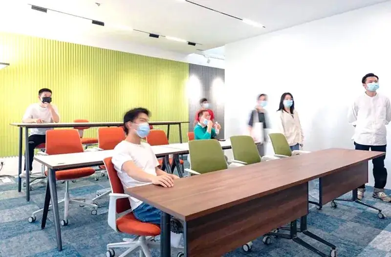 Meeting room with woven vinyl acoustic modular carpet tiles