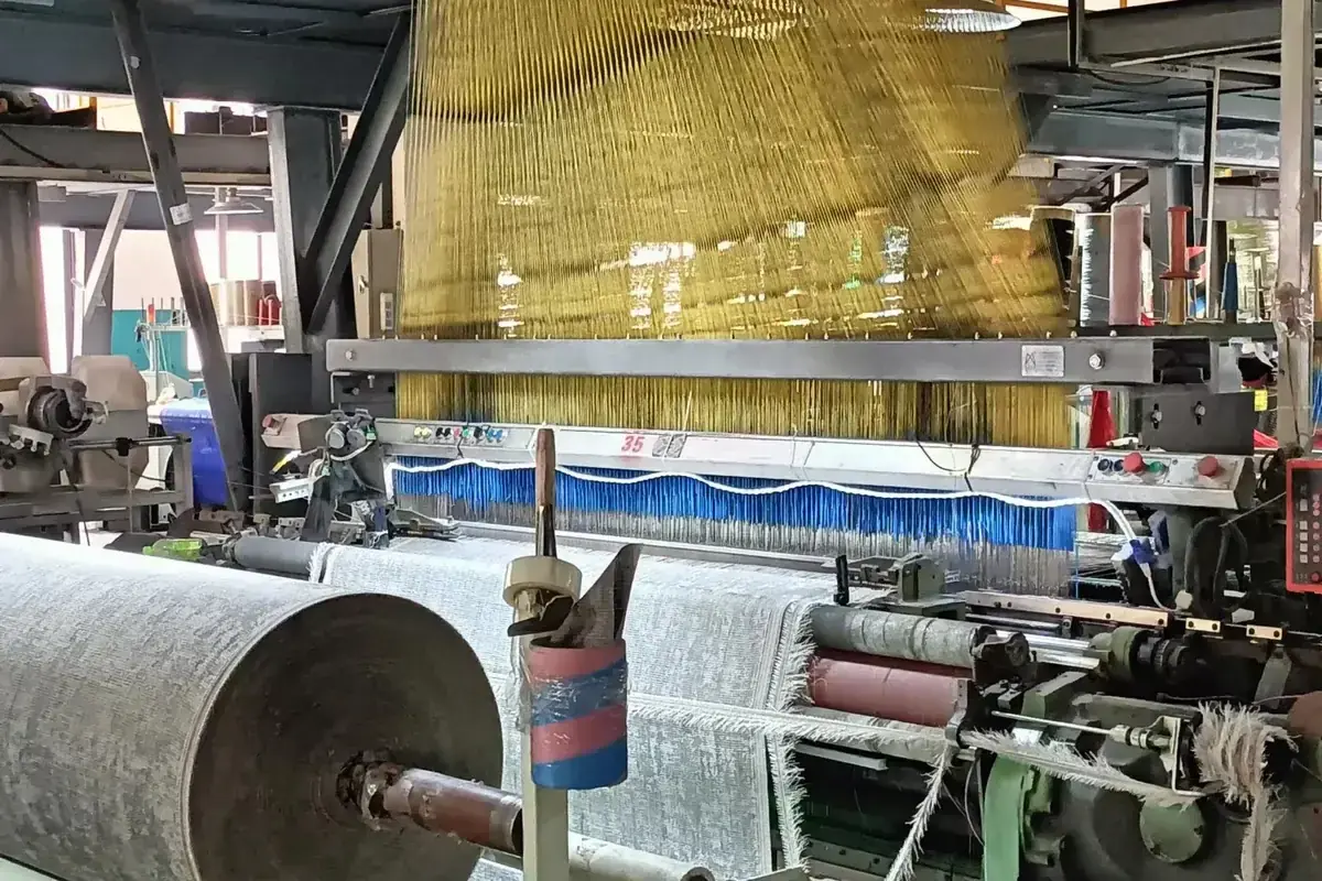On the loom at the woven vinyl production base in Zhejiang