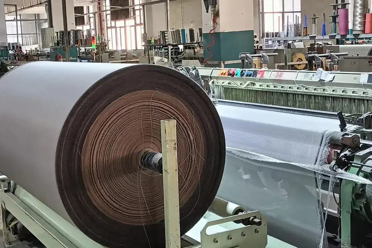 New greige roll coming off the loom